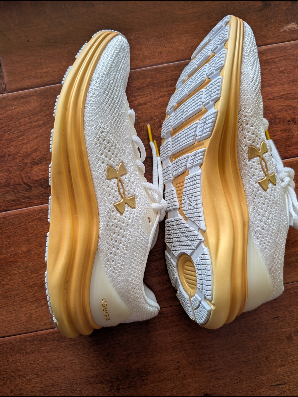 Under Armour Women’s Liquify White & Metallic Gold Running Shoes